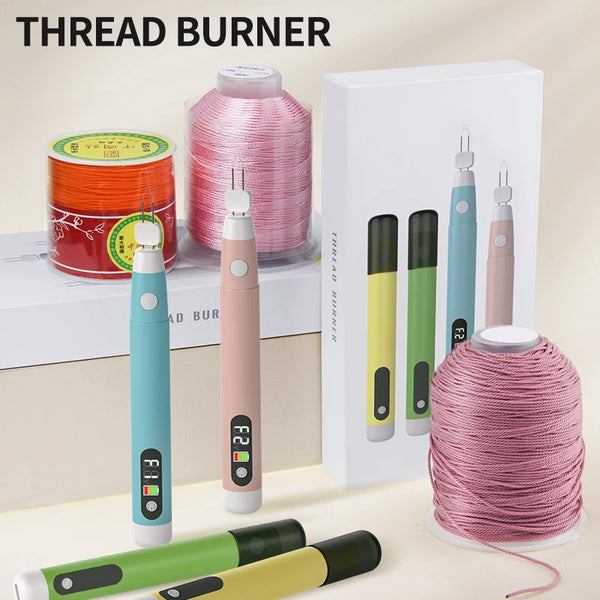 A set of handheld soldering wax pens for jewelry and crafting, including various colored pens and a spool of pink wire.