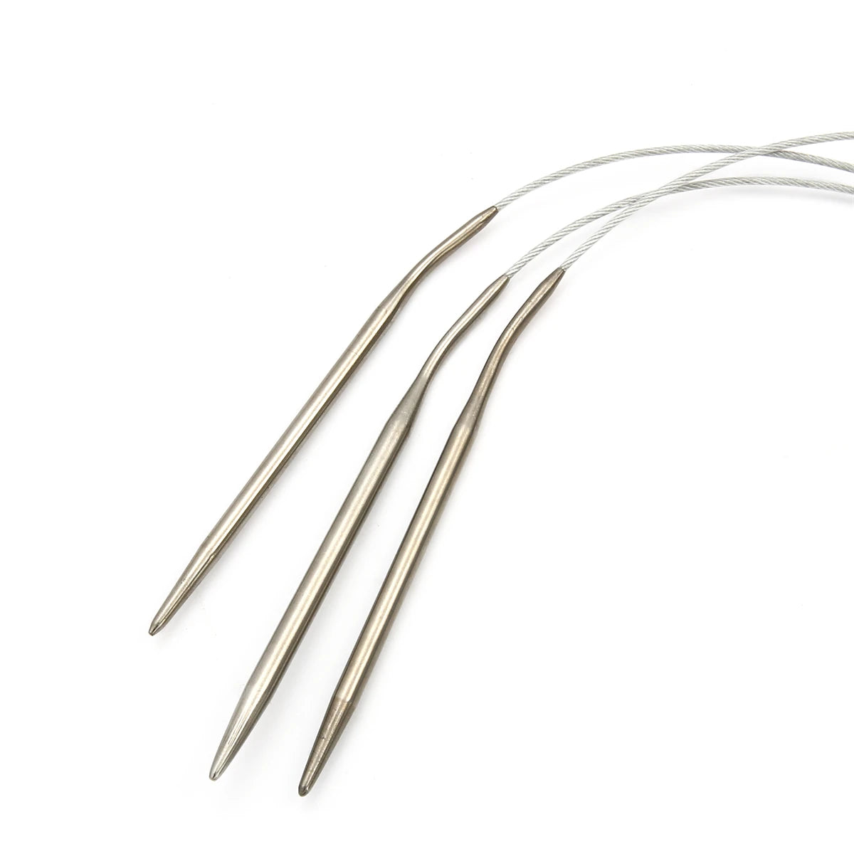 A set of stainless steel circular knitting needles with thin wires extending from the tips.