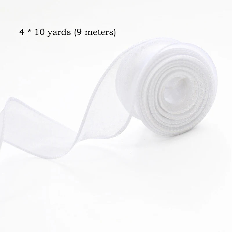 Roll of white silky organza ribbon measuring 4 times 10 yards or 9 meters for crafting and wrapping