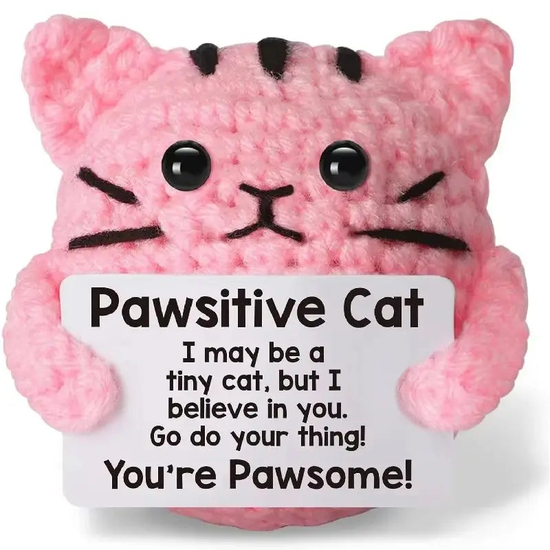 Pink fluffy cat plush toy with black stripes and a happy expression