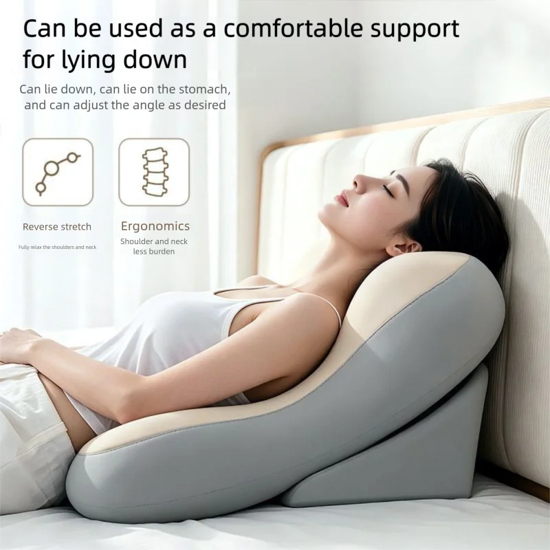 A woman is lying comfortably on a gray ergonomic memory foam pillow on a bed.