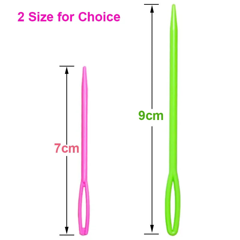A pair of bright green plastic sewing needles with large eyes shown next to a pink version.