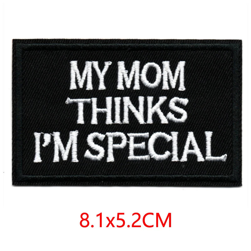 Black iron-on embroidered letter patch with white text that reads My Mom Thinks I'm Special