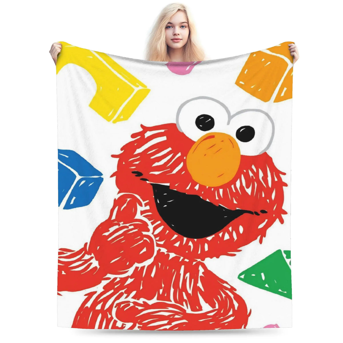 A person holds up a flannel throw blanket featuring an Elmo Friends cartoon character.