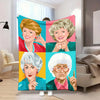 A vertical blanket featuring four portraits of elderly women in vibrant colors and retro style