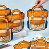 Orange and blue cartoon birthday party goodie bags with handles shown in various arrangements.