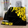Black flannel throw blanket featuring a playful yellow animal print design