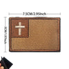 A rectangular brown embroidered patch featuring a white cross on the left and a textured field on the right.
