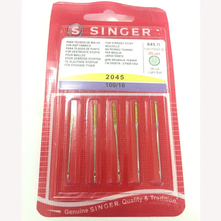 A package of 2045 Singer precision ball point sewing needles in a red plastic case.