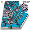 Cotton Satin Grand Wax fabric featuring a vibrant blue and purple floral pattern.