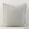A square, light gray linen throw pillow cover with vertical stripes on a white background.