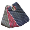 A stack of plaid waterproof mealtime bibs in navy blue and red checkered patterns.