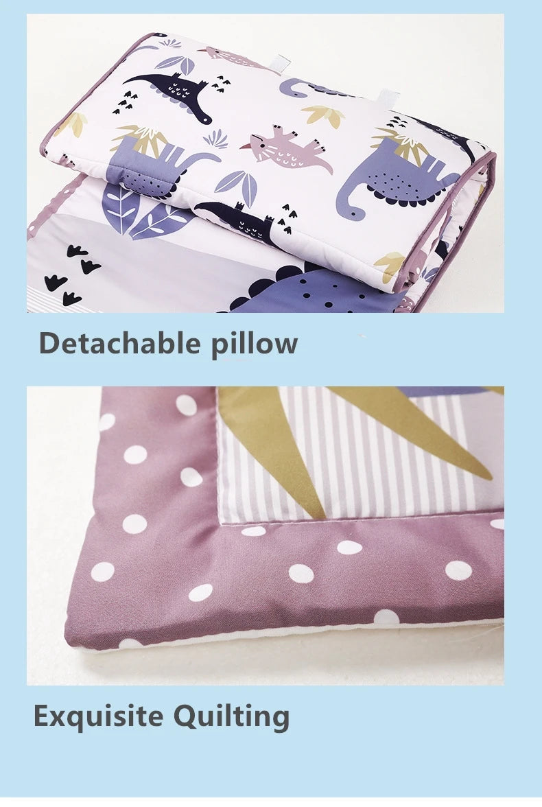 A detachable pillow and quilted mat set featuring various animal patterns in purple, white, and gray.