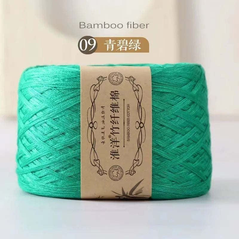 A spool of bright green bamboo fiber yarn labeled as item 09, ready for crafting.