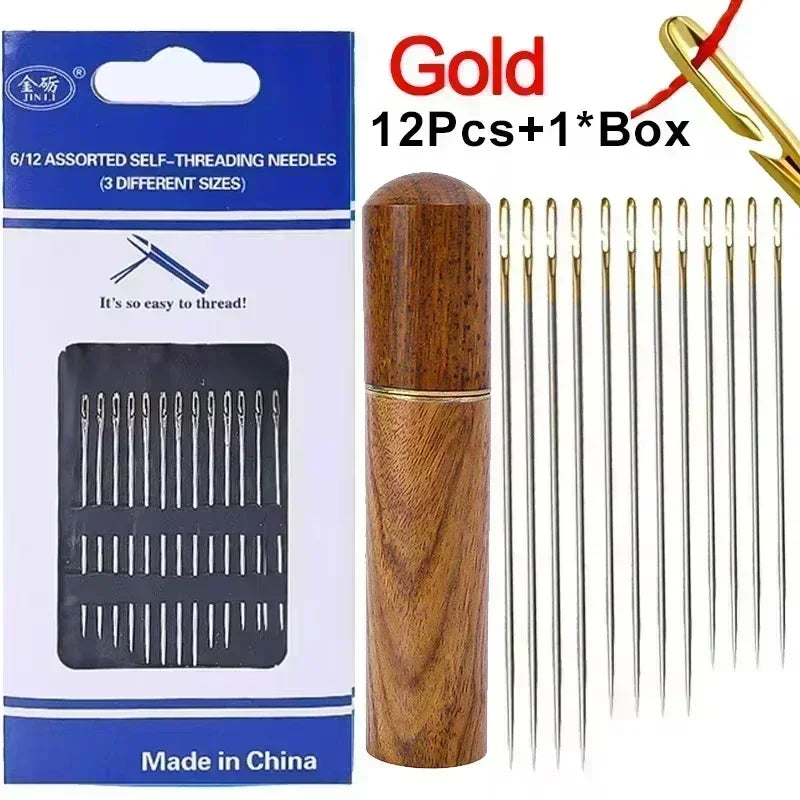 A box of 12 assorted self-threading stainless steel sewing needles with one box and a wooden storage tube.