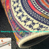 Close-up of a Boho Half-Round Non-Slip Area Rug showing intricate weaving patterns in multicolored threads.