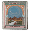 A rectangular throw blanket featuring a geometric design with celestial elements and the text The Moon.