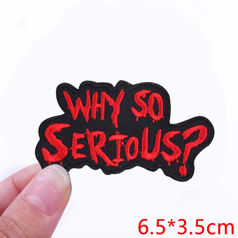 Black embroidered patch with red text that reads Why so serious