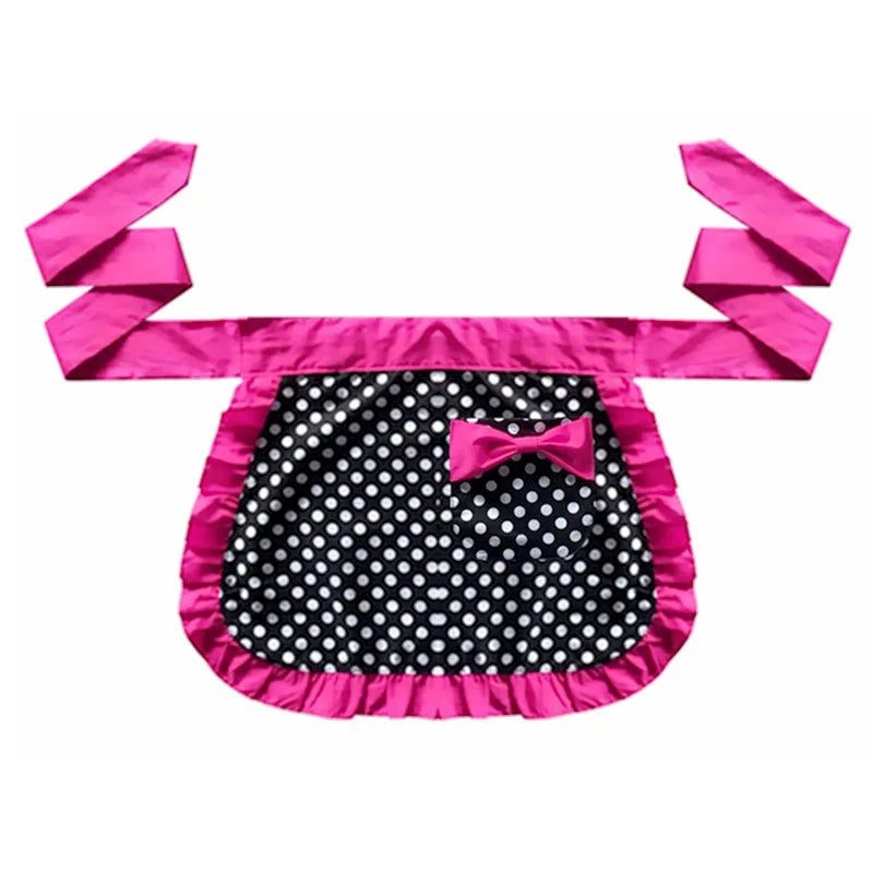 Pink ruffle apron with black polka dots and a pink bow
