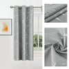 Gray marble pattern blackout curtains hanging in a window frame.