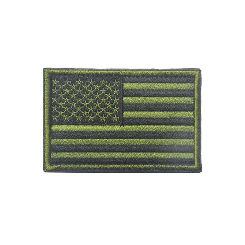 A rectangular patch featuring the design of the American flag with a hook and loop backing.