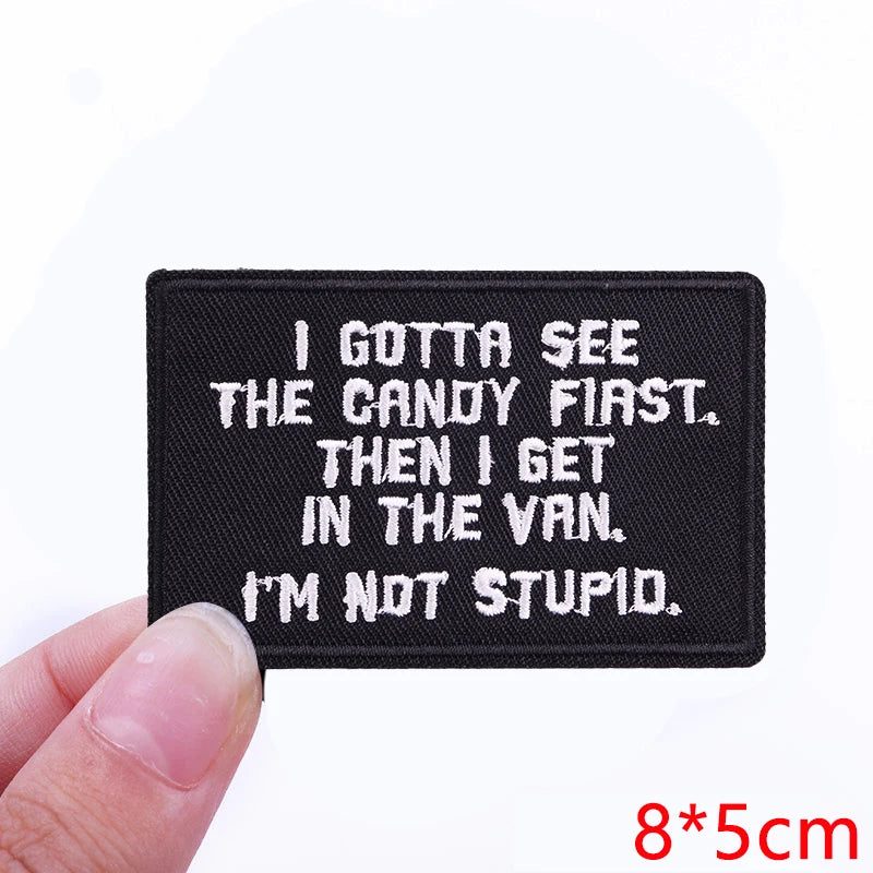 Black embroidered patch with white text that reads I GOTTA SEE THE CANDY FIRST THEN I GET IN THE VAN I'M NOT STUPID