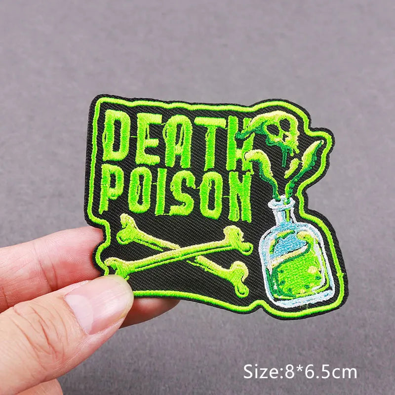An embroidered patch featuring a skull and poison bottle design in neon green and black thread.