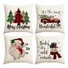 A set of four Christmas themed throw pillows featuring holiday greetings and seasonal imagery.