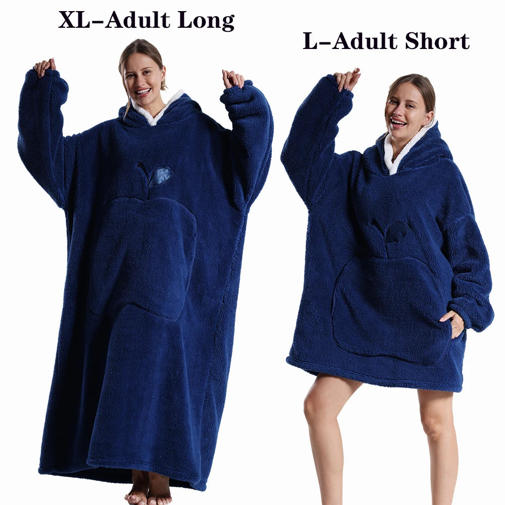 A woman models a dark blue XL adult long fleece blanket hoodie and an L adult short fleece blanket hoodie.