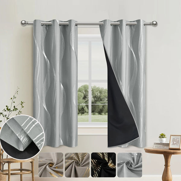Gray and black marble pattern blackout curtains hanging in a window frame.