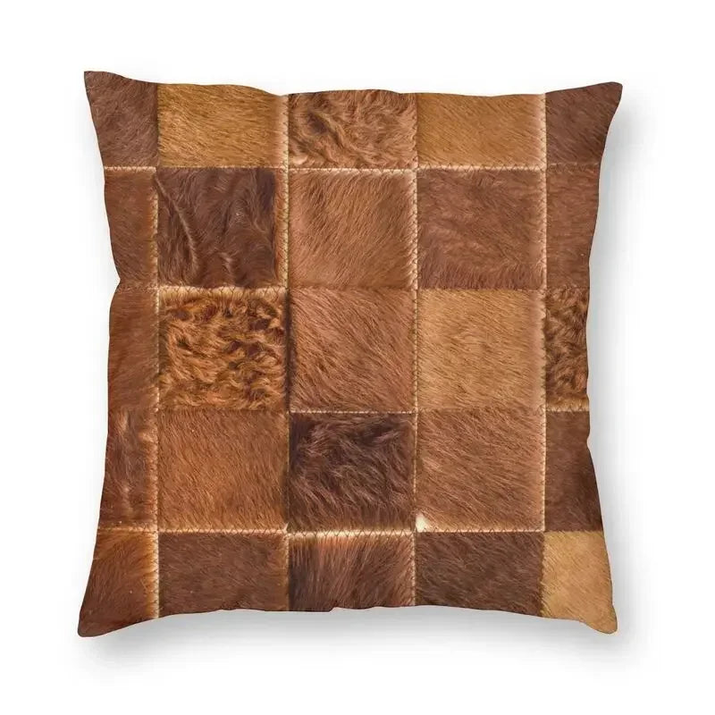 A square faux fur cowhide print cushion cover featuring a brown and tan checkered pattern.