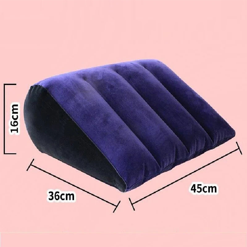 A dark purple inflatable body support pillow shown from above with dimensions 36cm by 45cm and a height of 16cm.