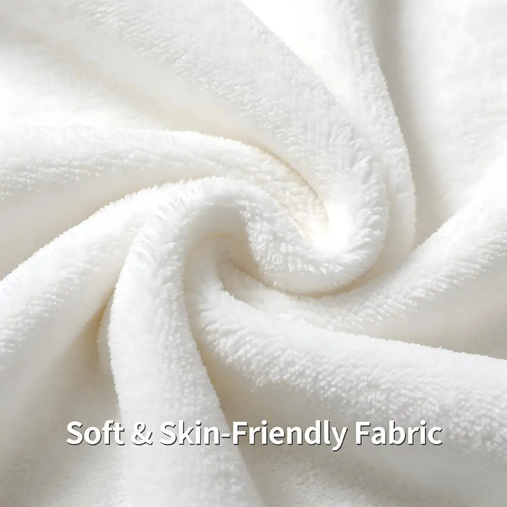 A close-up of a white, fluffy fabric texture used for a throw blanket.