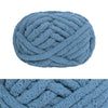 A ball of hand-knitted wool finger line scarf in light blue color.