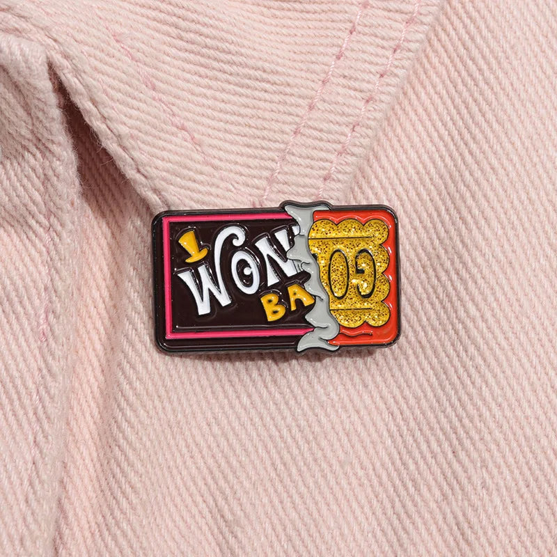 A vintage enamel lapel pin featuring the text WON BA in a stylized font with a gold emblem.