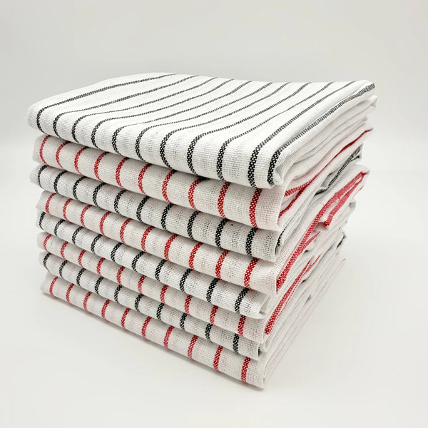 A stack of striped cleaning cloths in white, black, and red patterns.