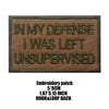 Dark olive embroidered patch with text IN MY DEFENSE I WAS LEFT UNSUPERVISED