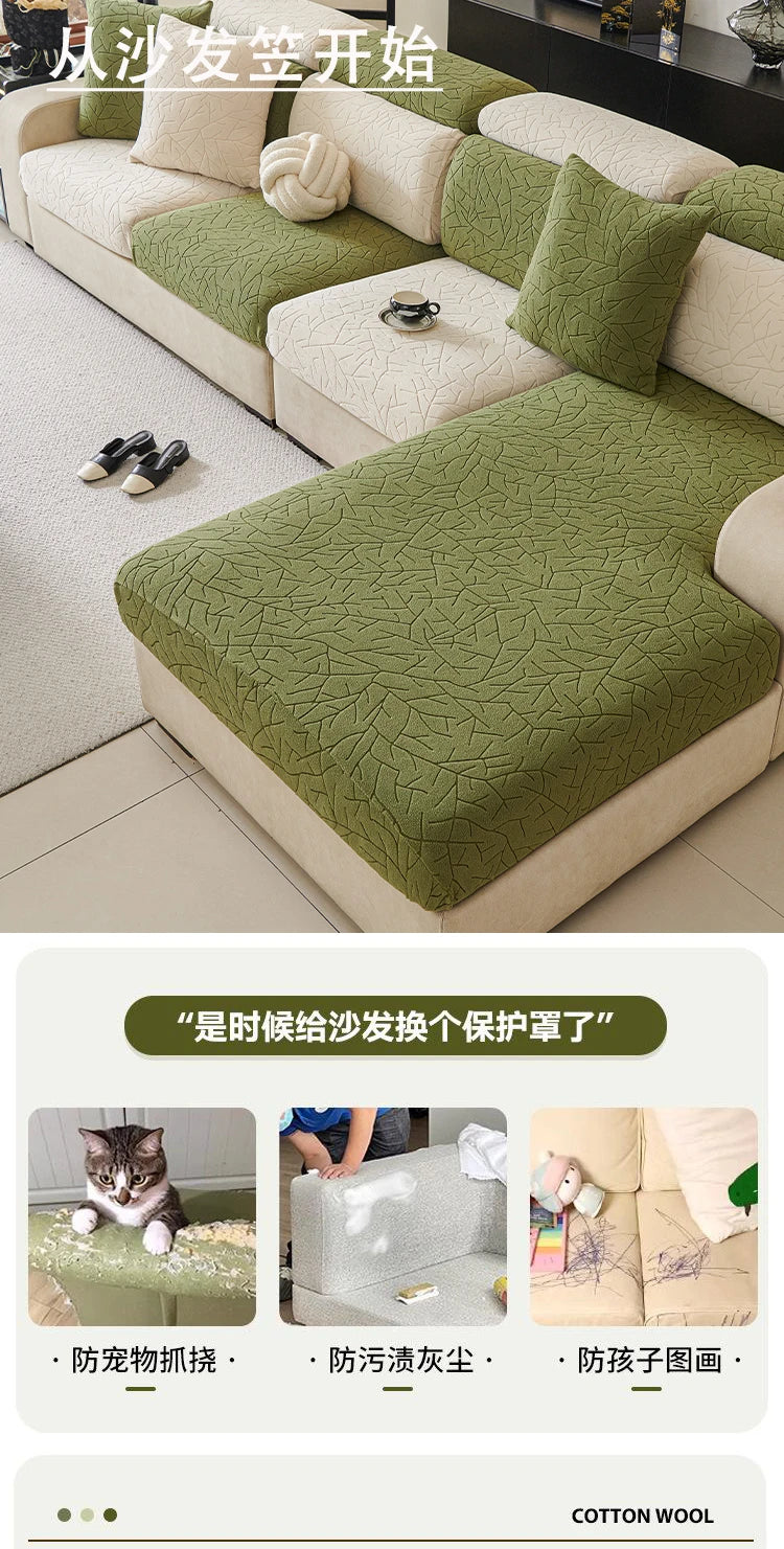 A light green patterned jacquard sofa cover displayed on a beige sectional sofa, with various accessories nearby.