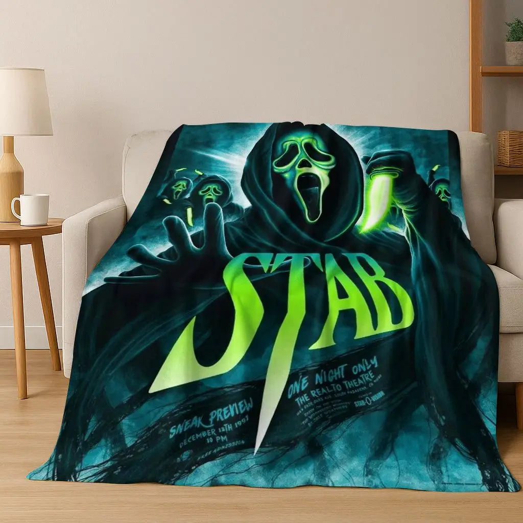 A dark teal and green graphic featuring a horror character design on a flannel throw blanket.