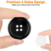 A hand holds a black resin sewing button, demonstrating the four holes design.