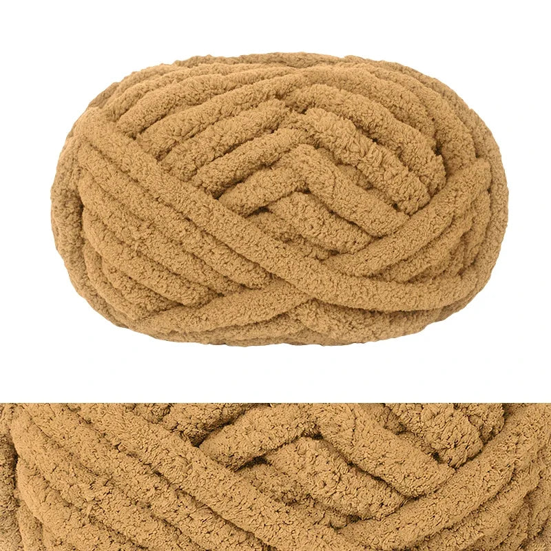 A tightly coiled, hand-knitted wool finger line scarf in a natural tan or beige color.