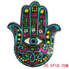 A handprint design featuring a vibrant multicolored eye with glitter sequins on a black background.