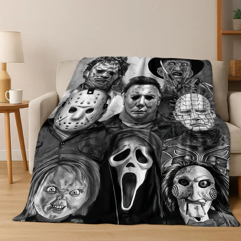 A dark, moody illustration featuring various horror movie characters and monsters on a blanket.