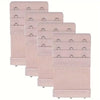 A pack of four pink bra strap extenders with adjustable clips and mesh fabric.