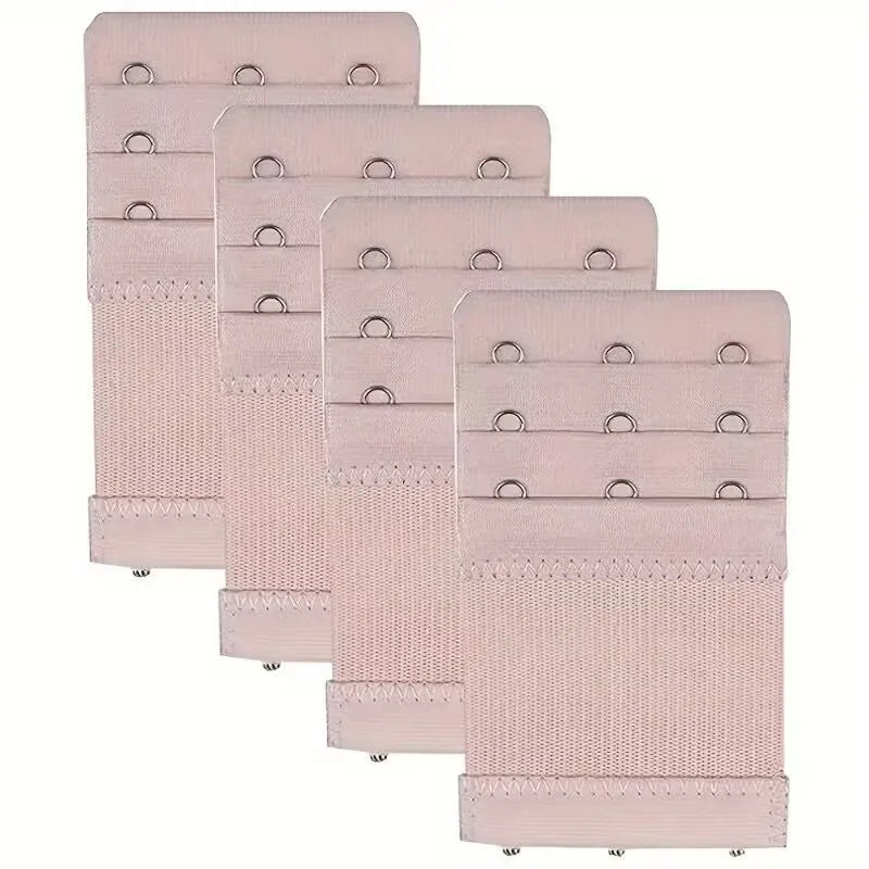 A pack of four pink bra strap extenders with adjustable clips and mesh fabric.