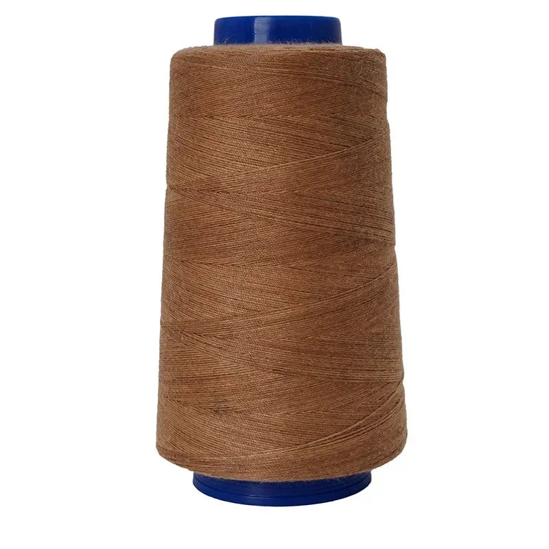 A spool of heavy-duty waterproof sewing thread in a brown color with a blue core.
