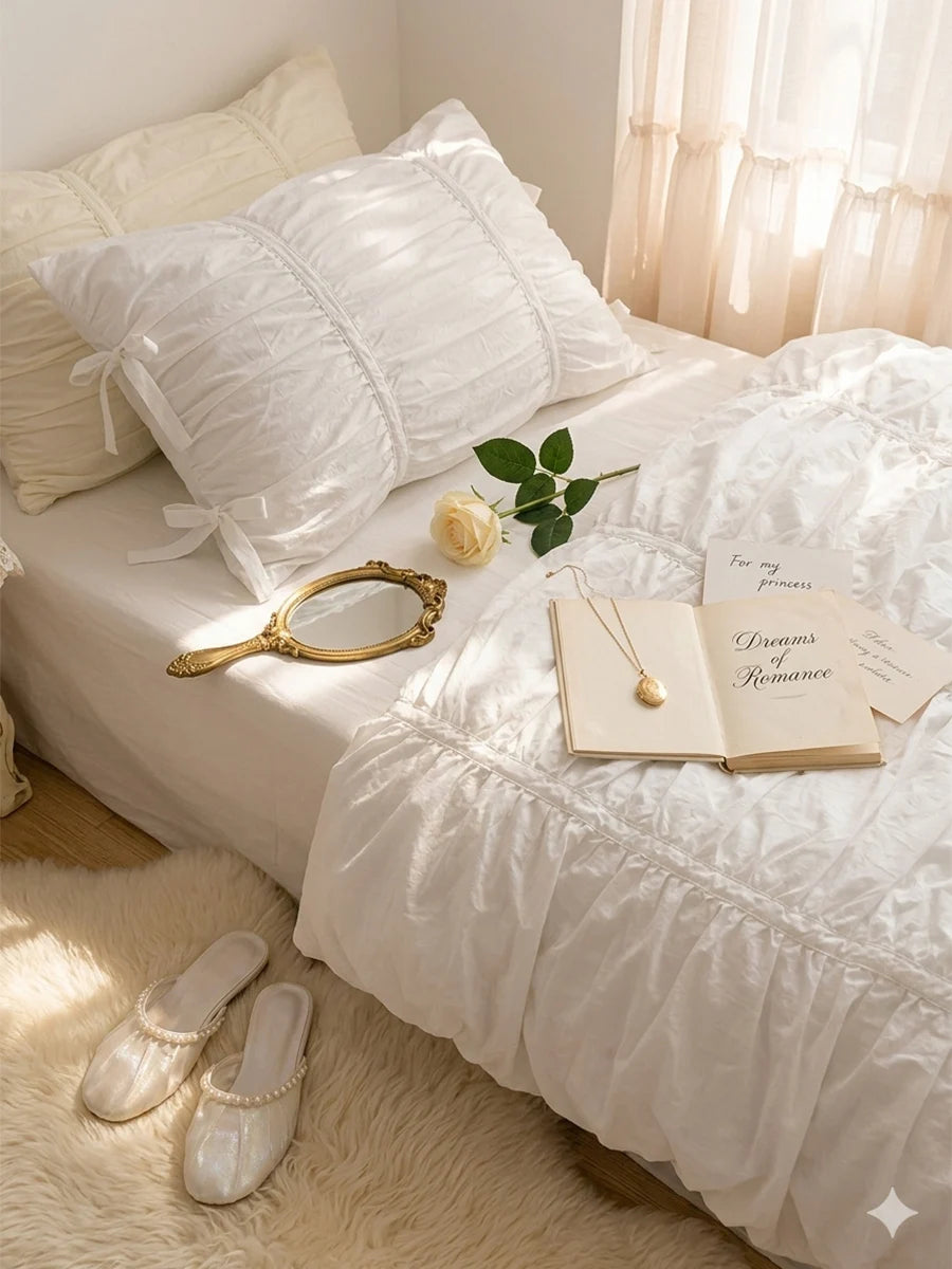 Pure white princess ruffle cotton bedding set with pillows and a book on a bed