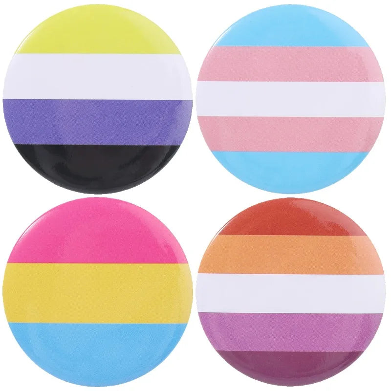 A set of seven colorful rainbow striped tinplate pins featuring various colors and patterns.