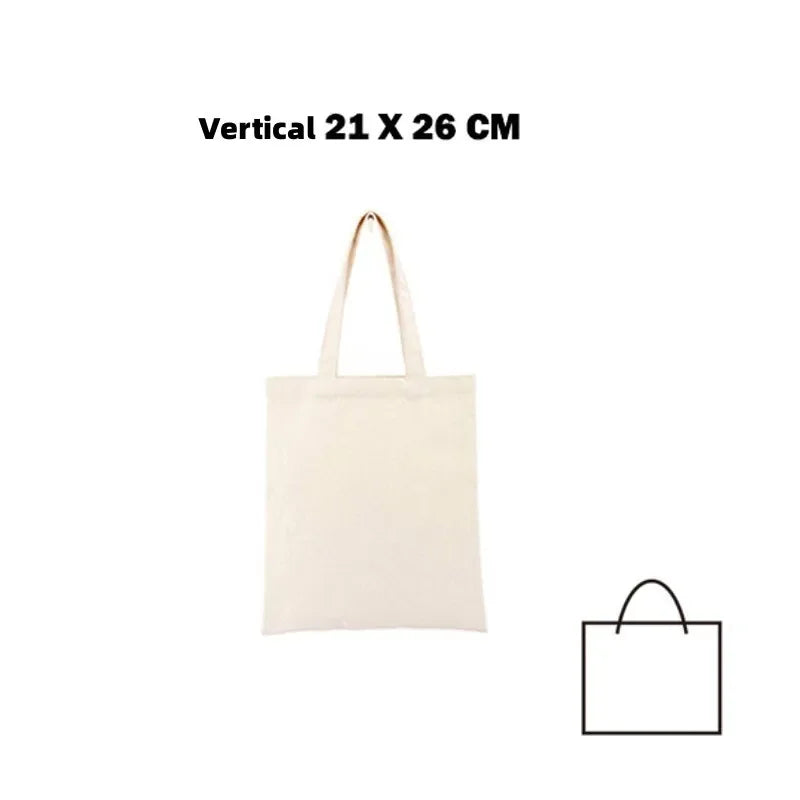 A beige canvas tote bag shown vertically, measuring 21 x 26 cm.