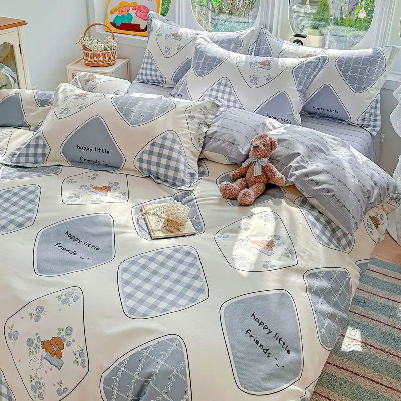 A light pink duvet and pillow set featuring a pattern of happy little friends and gingham designs.